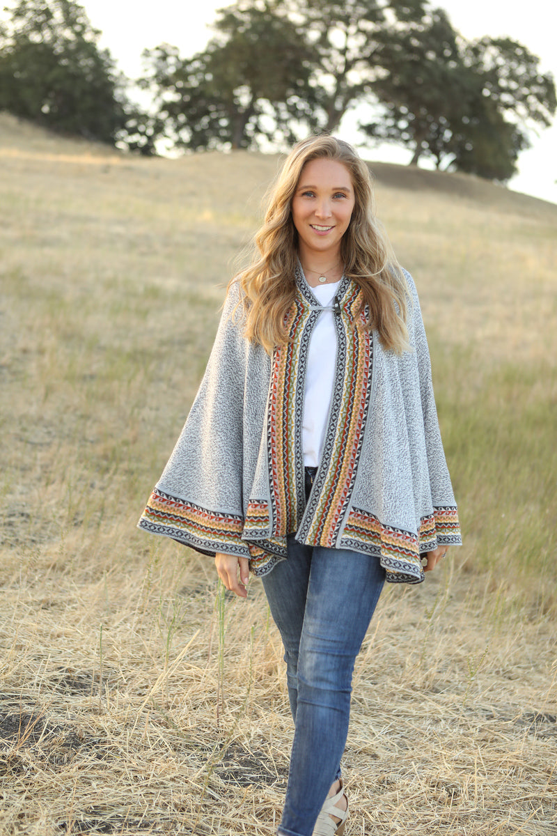 Alpaca knitted capes with one wooden button