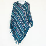 Alpaca poncho with small, elegant folds