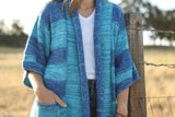 Medium length Cardigan with square pockets