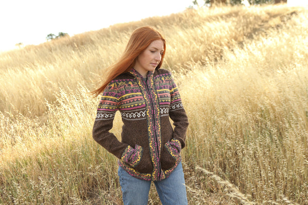 Alpaca sweater with zipper and hextech design around zipper with pockets and hoodie