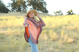 Poncho with neck warmer and sleeves