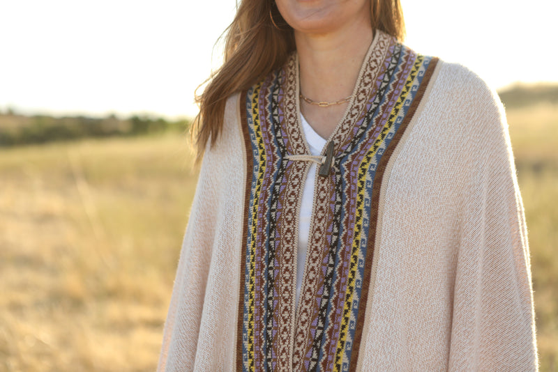 Alpaca knitted capes with one wooden button