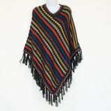 Alpaca poncho with small, elegant folds