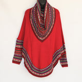 Poncho with neck warmer and sleeves