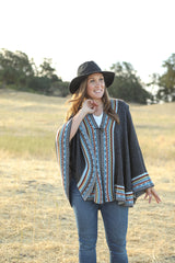 Alpaca knitted capes with one wooden button