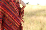 Alpaca poncho with small, elegant folds