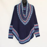 Poncho with neck warmer and sleeves