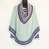 Poncho with neck warmer and sleeves